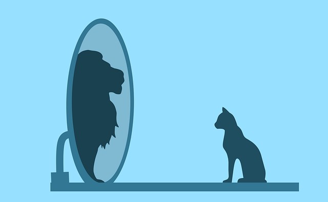 Cat looking in mirror as Lion. Moral story in Hindi.